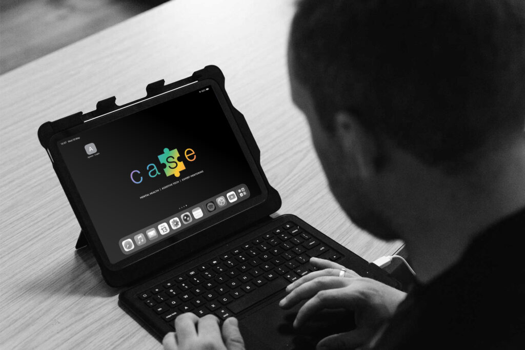 Assistive technology – learner typing on an iPad – learner support services