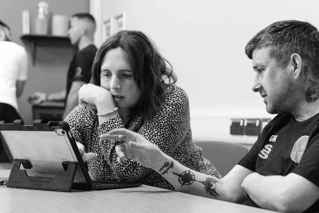 Assistive technology – mentor guiding a learner through assistive technology – learner support services