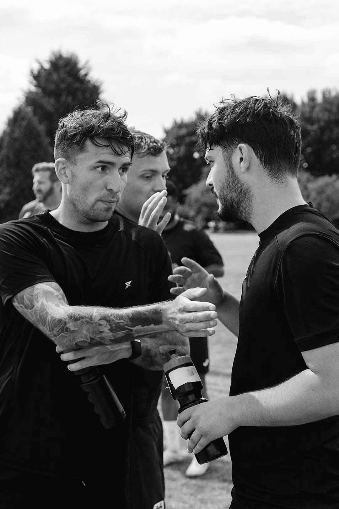 Mental health support – learners shaking hands after training – CASE learner support