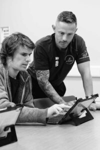 Assistive technology &ndash; coach in conversation with a learner &ndash; CASE learner support